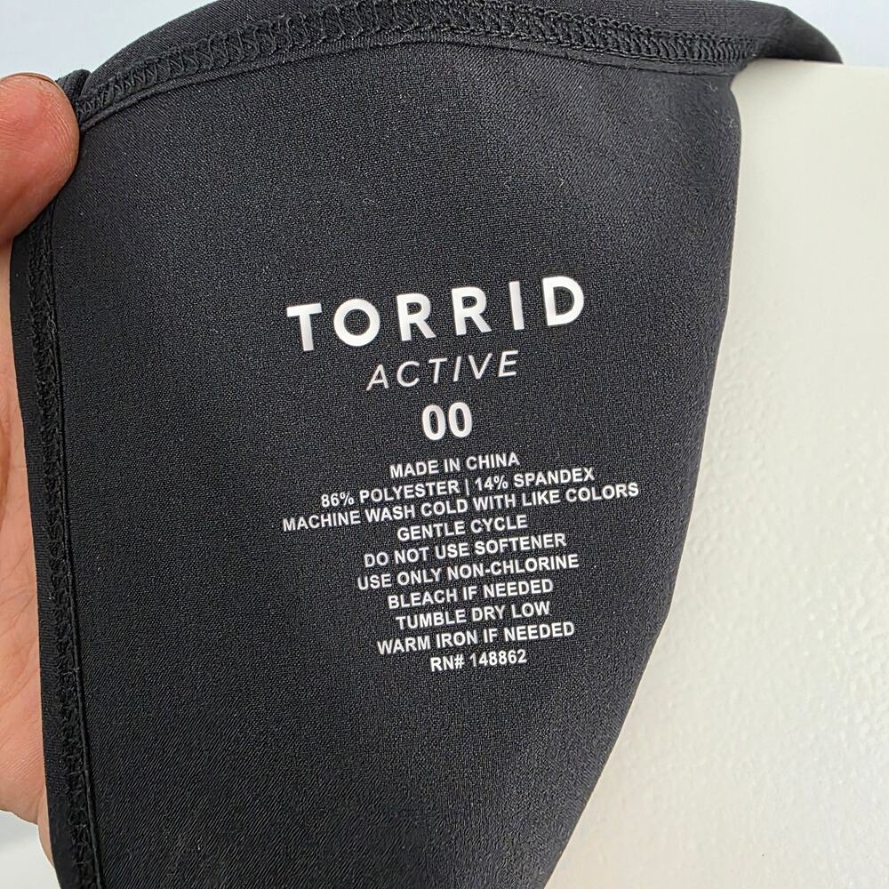 Torrid Stretch Woven Active
Romper With Surplice Back - Picture 7 of 7